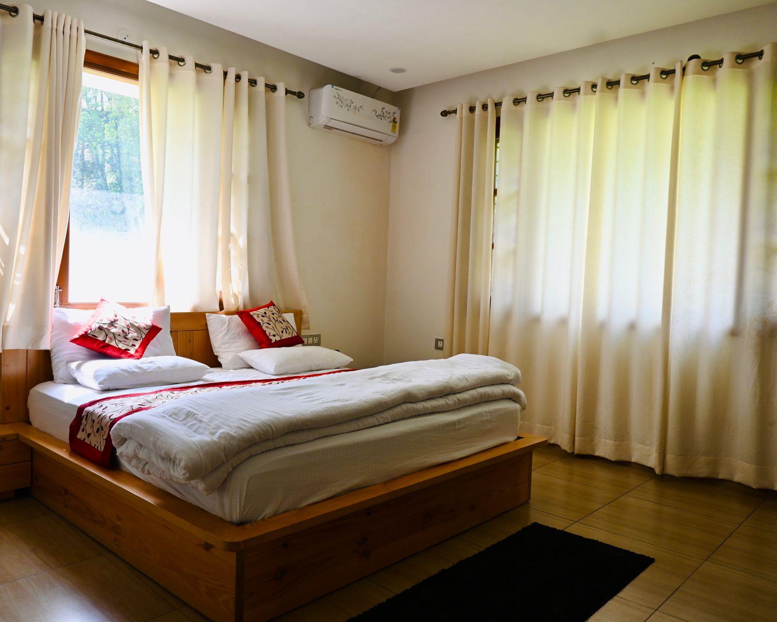A bedroom by day